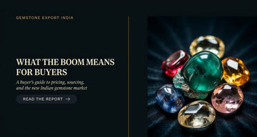 Natural gemstone rings and loose coloured stones displayed on a dark velvet surface, representing India's gemstone export boom and its impact on buyers