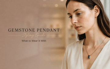 Natural gemstone pendant styling guide — woman wearing a blue sapphire Neelam pendant in gold bezel setting