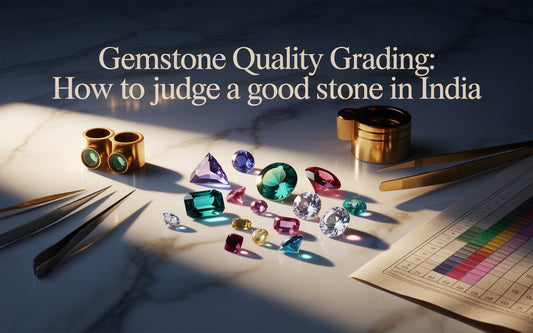 Various precious stones, tweezers, a loupe, and a grading chart on a desk, illustrating how to evaluate gemstone quality in India.