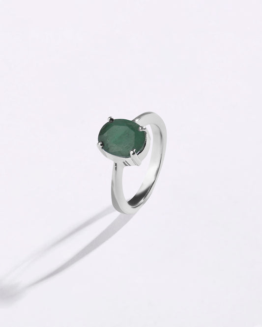Natural green emerald ring in 925 silver with oval gemstone and prong setting for men and women in India