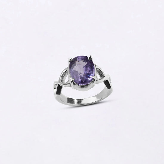 Powerful natural Alexandrite gemstone ring handcrafted in 925 sterling silver featuring a vibrant color-changing gemstone in an elegant Urja setting with a polished finish from Myra Gems.