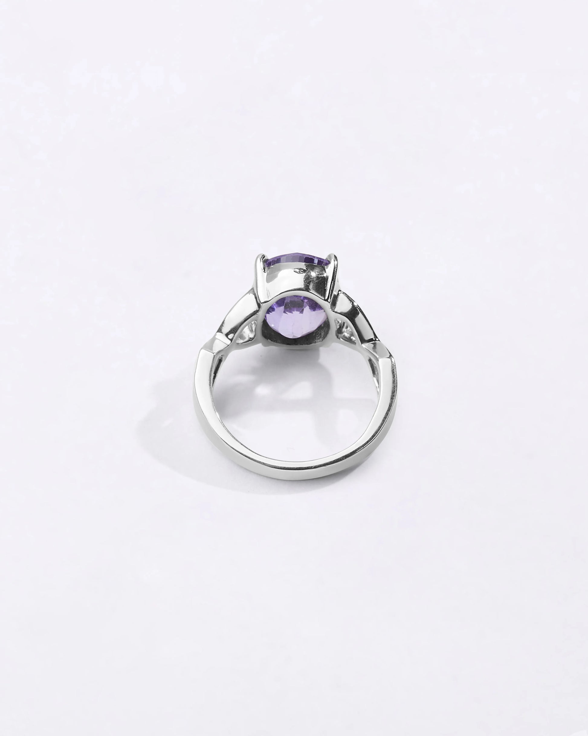 Powerful natural Alexandrite gemstone ring handcrafted in 925 sterling silver featuring a vibrant color-changing gemstone in an elegant Urja setting with a polished finish from Myra Gems.