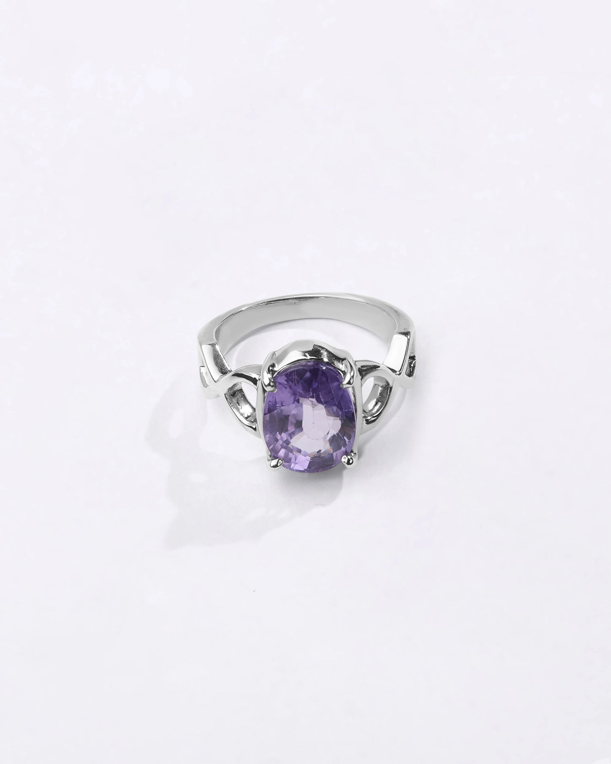 Powerful natural Alexandrite gemstone ring handcrafted in 925 sterling silver featuring a vibrant color-changing gemstone in an elegant Urja setting with a polished finish from Myra Gems.