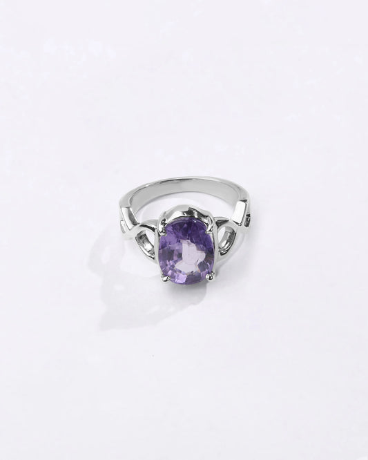 Powerful natural Alexandrite gemstone ring handcrafted in 925 sterling silver featuring a vibrant color-changing gemstone in an elegant Urja setting with a polished finish from Myra Gems.