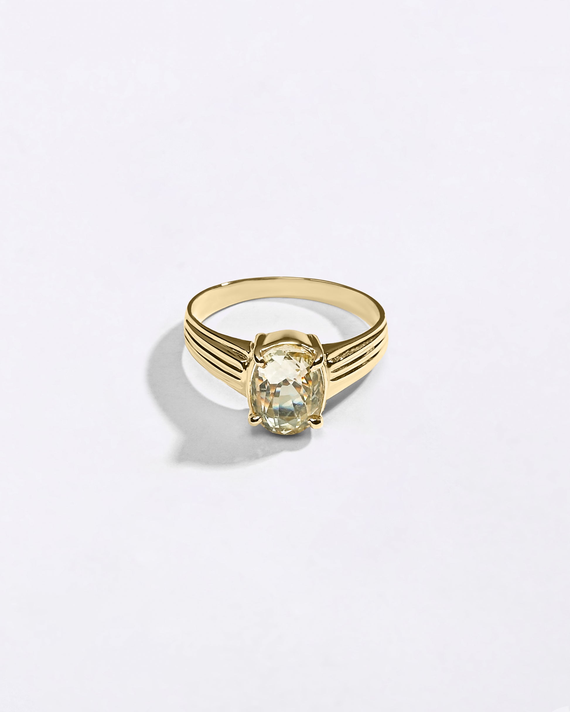 Superior Designs of White Sapphire Ring in Gold from Myra Gems