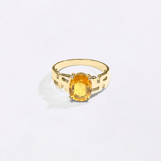 Swastik Yellow Sapphire Ring In 18K Gold from Myra Gems