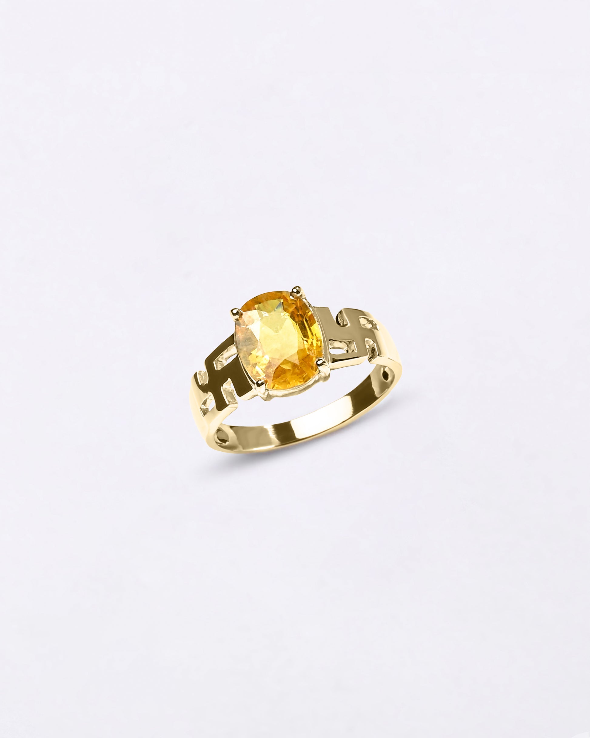 Swastik Yellow Sapphire Ring In 18K Gold from Myra Gems